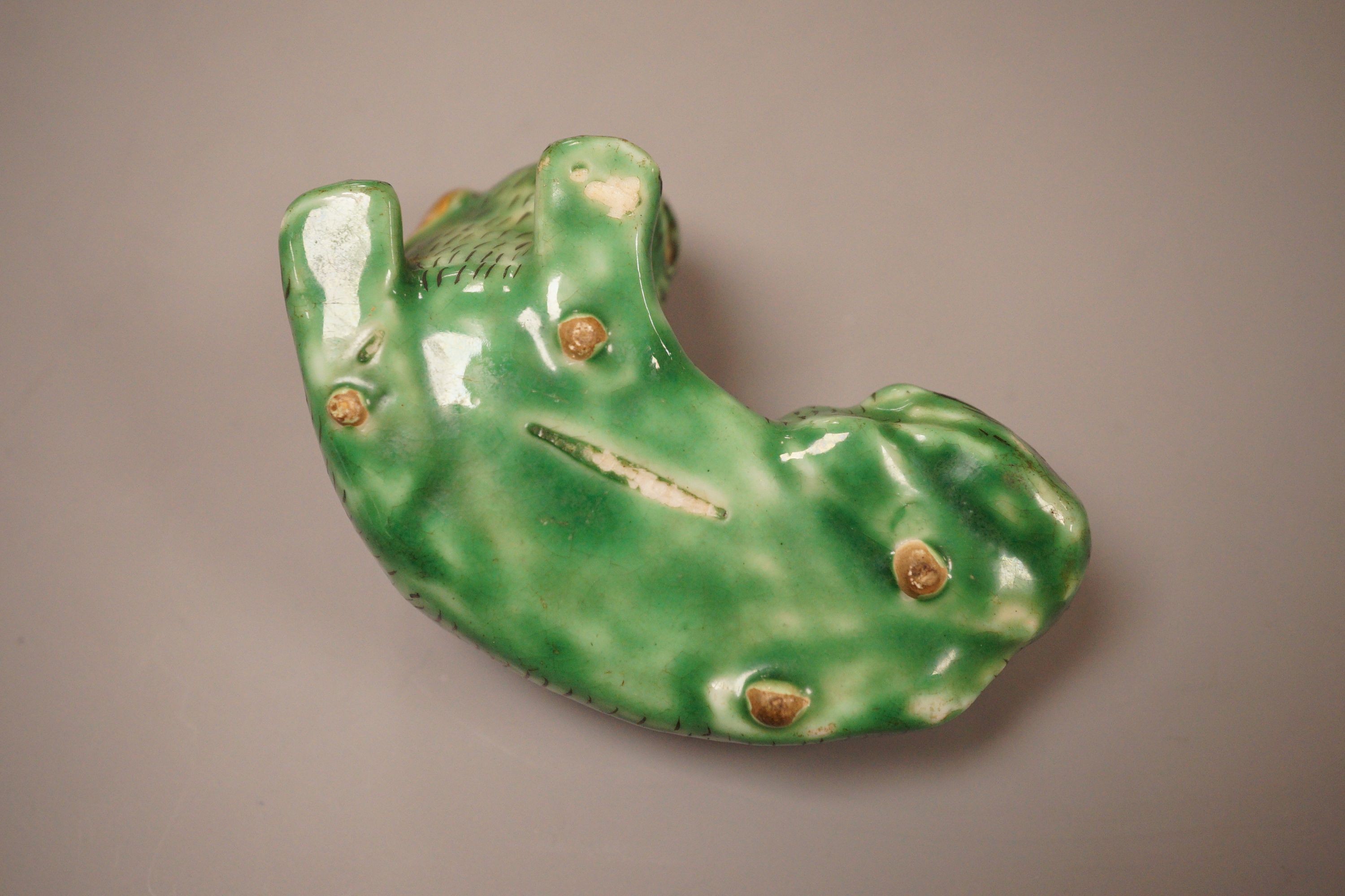 A small Chinese or Japanese green glazed dog waterdropper, 8.5cm wide